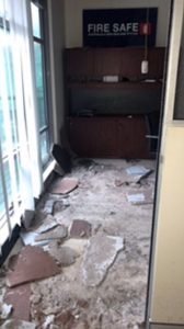 office damage due to roof collapse and rain water