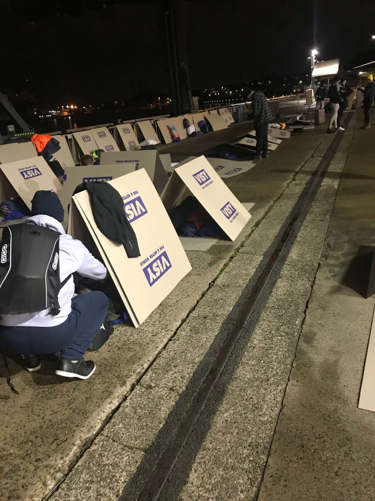 people-sleeping-under-boxes